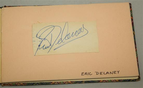 An autograph book with tartan covers,